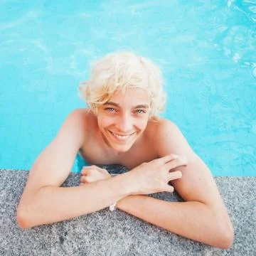 Handsome in the pool outdoor Stock Photos