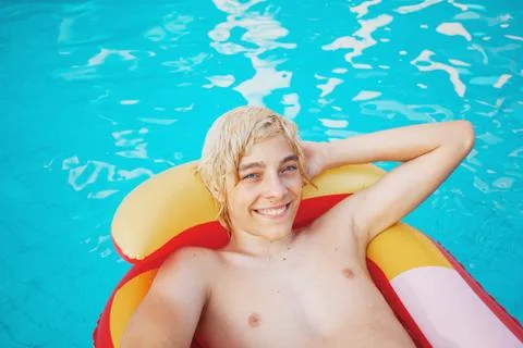 Handsome in the pool outdoor Stock Photos