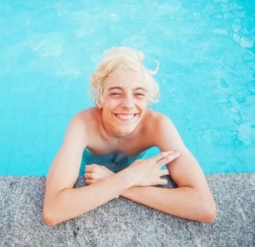 Handsome in the pool outdoor Stock Photos