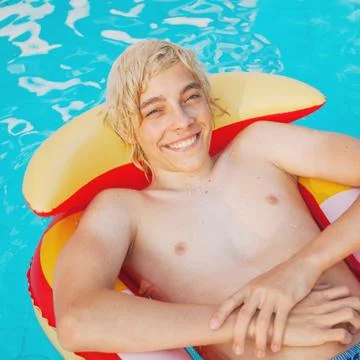 Handsome in the pool outdoor Stock Photos