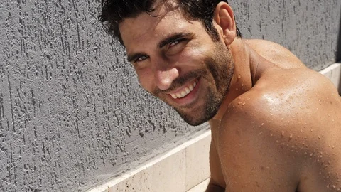 Handsome poolside guy Stock Footage 89463765