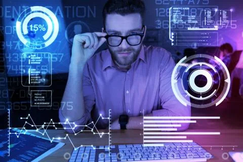 Handsome professional IT man working at night Stock Photos