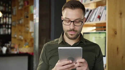 Handsome Professional Young Entrepreneur Testing An Online Application On An Video stock 77285576