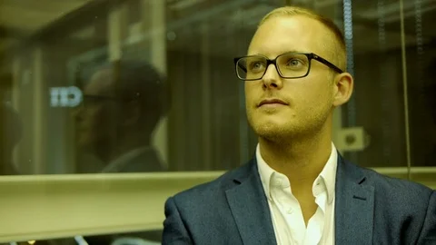 Handsome sales man standing in elevator thinking about future business concept Stockbeeldmateriaal 72869046