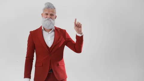 Handsome Santa,pointing to side emptyplace,showing copyspace Stock Footage 129867065