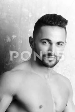 Handsome sexi man showing fit chest Stock Photos