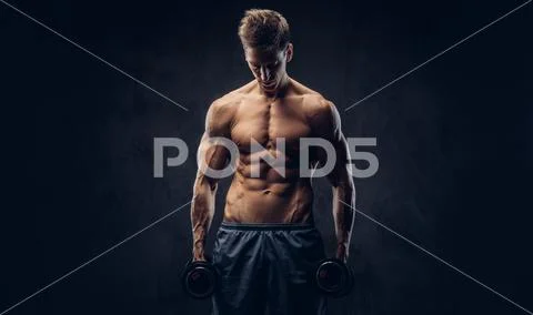 Handsome shirtless man with stylish hair and muscular ectomorph