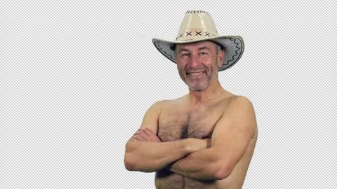 Handsome shirtless mid-aged man in cowboy hat posing with crossed arms on chest Stock Footage 306096884
