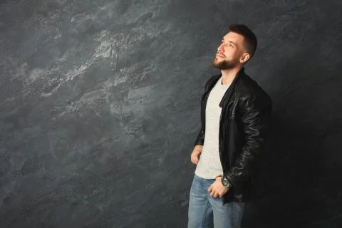 Handsome smiling man posing in studio Foto stock