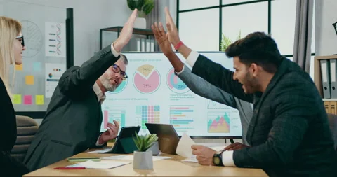 Handsome smiling satisfied experienced bearded head of company giving high five Stock Footage 160954889