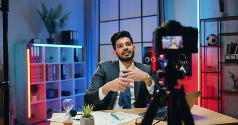 Handsome smiling successful skilled bearded businessman in formal wear recording Stock Footage 166558967