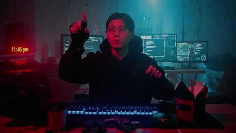 Handsome software developer gesturing with hands in air Stock Footage 257384412