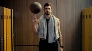 Handsome Sportsman Spinning Basketball In Finger Stock Footage