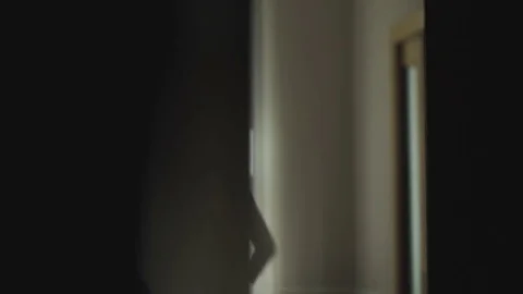 Handsome Standing Near Window Video stock 78013641
