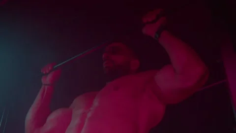 Handsome strong athletic men pumping up back muscles workout fitness . Stock Footage 239553644