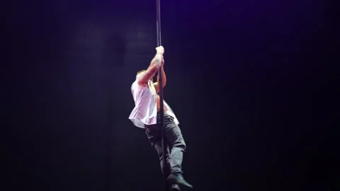 Handsome strong man pole dance. Stock Footage 275242109