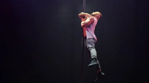 Handsome strong man pole dance. Stock Footage 275242141