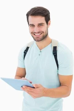 Handsome student using his tablet pc Stockfoto's