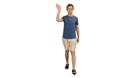 Handsome student waving hand hello while walking, alpha channel Video stock 92797482