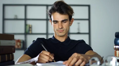 Handsome Student Writting Notes, Studying At Home, Distant Study, University Stock Footage 93274332