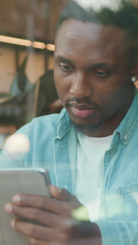 Handsome trendy busy high-skilled 30-aged modern african american with well-groo Stock Footage 325439929