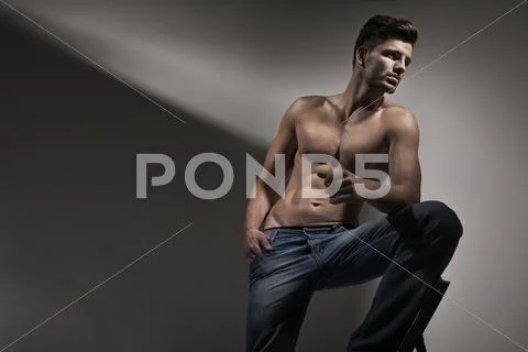 Handsome well built man with great haircut Stock Photos