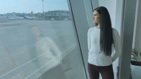 Handsome woman looks at the runway Stock Footage