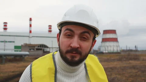 Handsome worker looking and smiling at camera Stock Footage 142860049