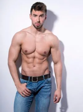 Handsome, young and fit man with six pack Stock Photos