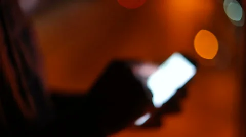 Handsome, young asain man with tablet computer in city at night Stock Footage 63571758