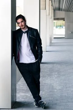 Handsome young bearded man posing outside Stock Photos