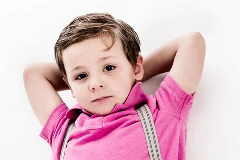 Handsome young boy looking to camera. Stock Photos