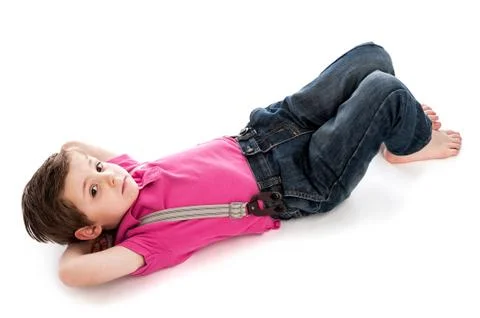 Handsome young boy lying down. Foto stock