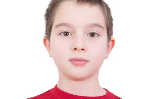 Handsome young boy with a serious expression Stock Photos