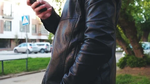 Handsome young business man using smartphone smiling happy outdoors. Stock Footage 75895605