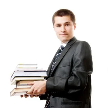Handsome young businessman holding stack of books, isolated Stock Photos