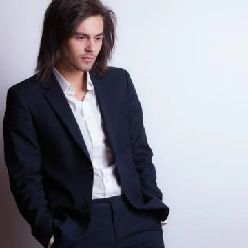 Handsome young elegant man studio portrait close-up. Stock Photos