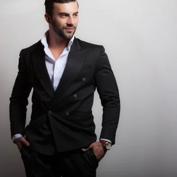 Handsome young elegant man studio portrait close-up. Stock Photos