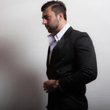 Handsome young elegant man studio portrait close-up. Stock Photos
