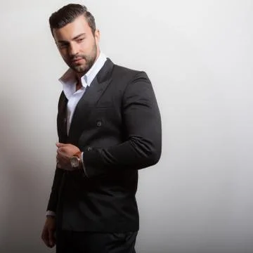 Handsome young elegant man studio portrait close-up. Stock Photos
