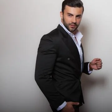 Handsome young elegant man studio portrait close-up. 스톡 사진