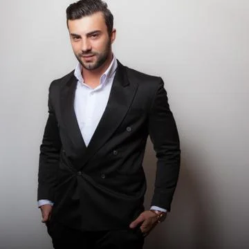 Handsome young elegant man studio portrait close-up. 写真素材