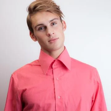 Handsome young elegant man studio portrait close-up. Stock Photos