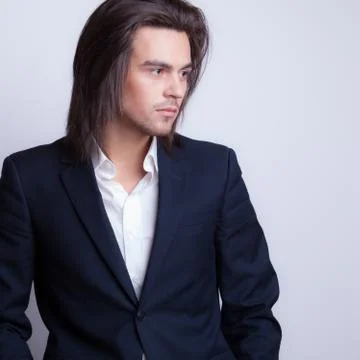 Handsome young elegant man studio portrait close-up. Stock Photos