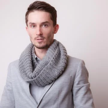 Handsome young elegant man studio portrait close-up. Stock Photos