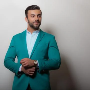 Handsome young elegant man studio portrait close-up. Stock Photos