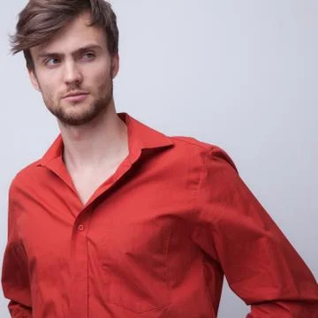 Handsome young elegant man studio portrait close-up. Stock Photos
