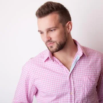 Handsome young elegant man studio portrait close-up. Stock Photos