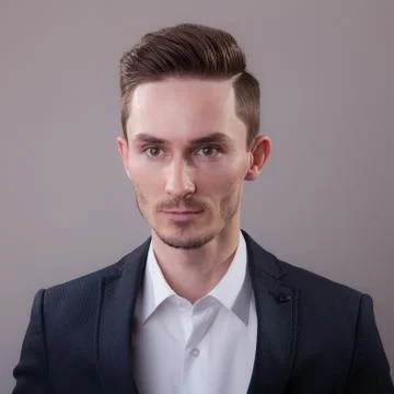 Handsome young elegant man studio portrait close-up. 스톡 사진