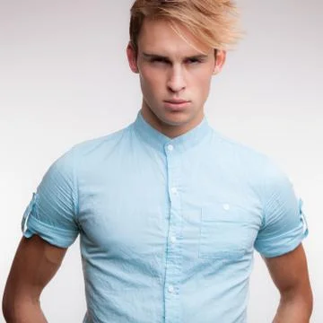 Handsome young elegant man studio portrait close-up. Stock Photos